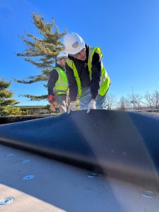 Maumee River Roofing-Team-Installing-Roof-YWCA