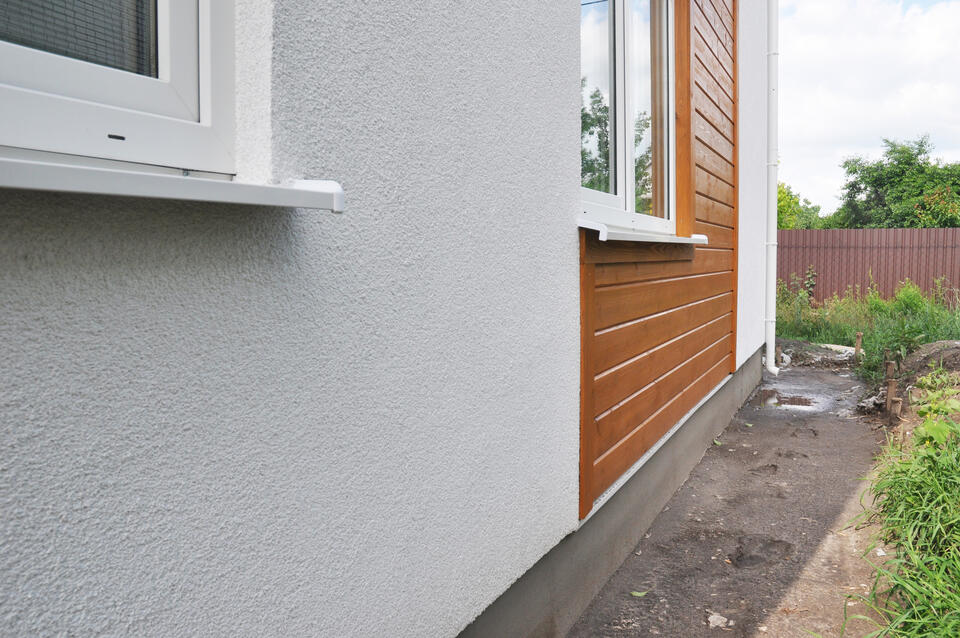 best siding for house-stucco house with wood accents