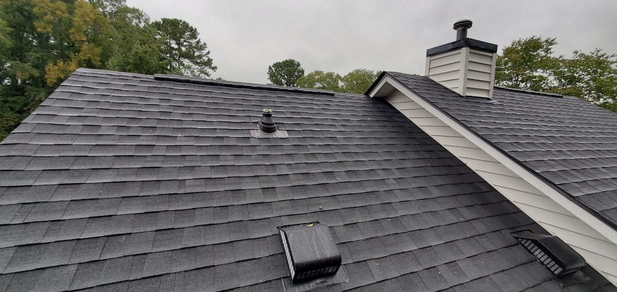 cost of metal roof vs shingle New roof on a white house