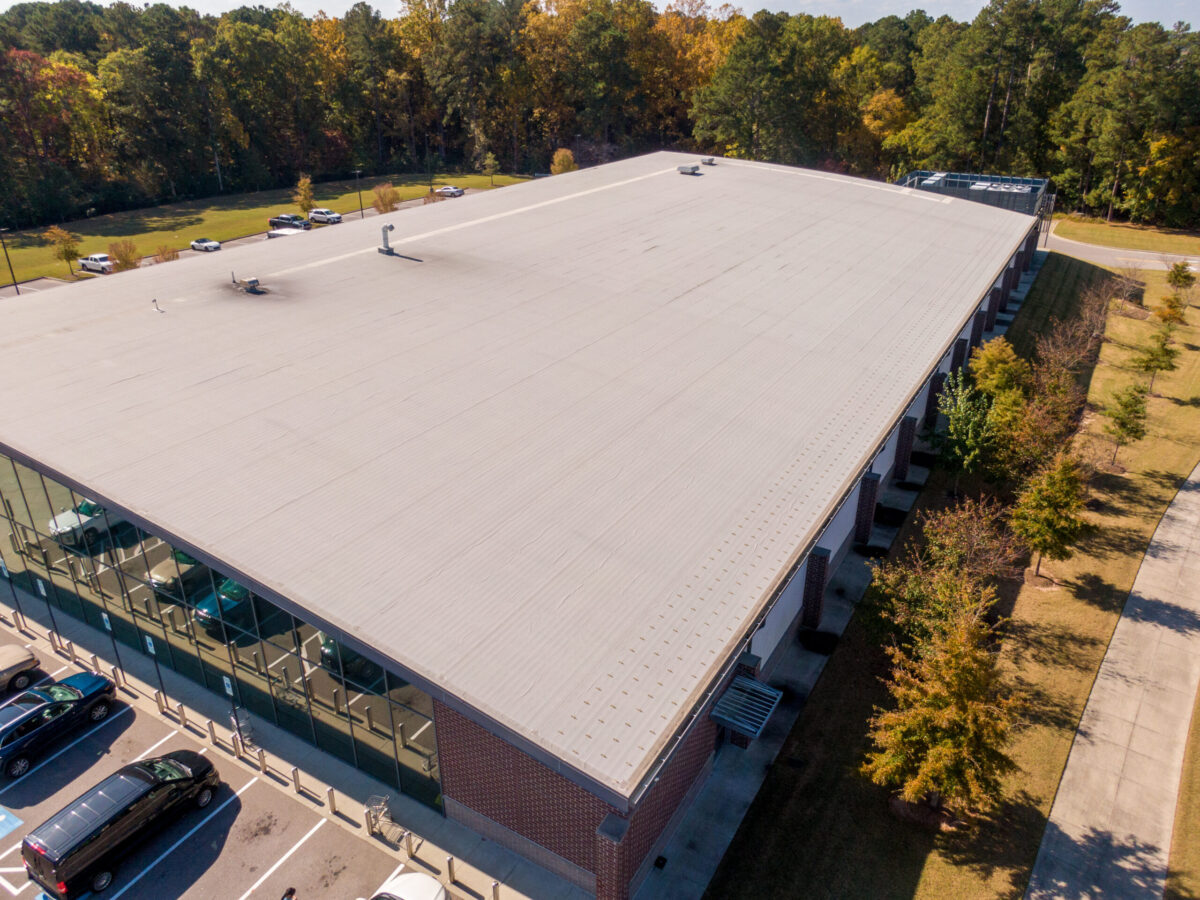 commercial roof cleaning Sunny Daytime Drone Images of a Large Commercial Roof.