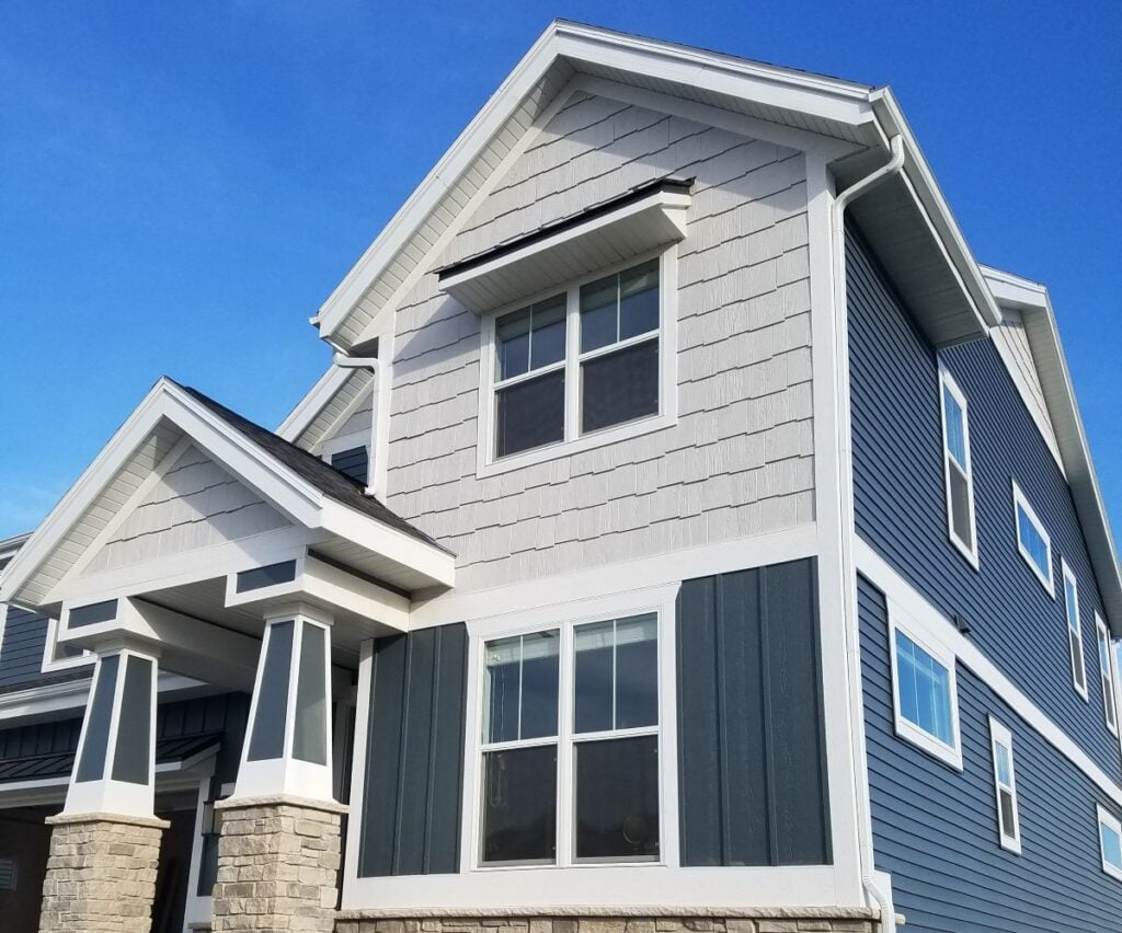 white horizontal siding and dark siding