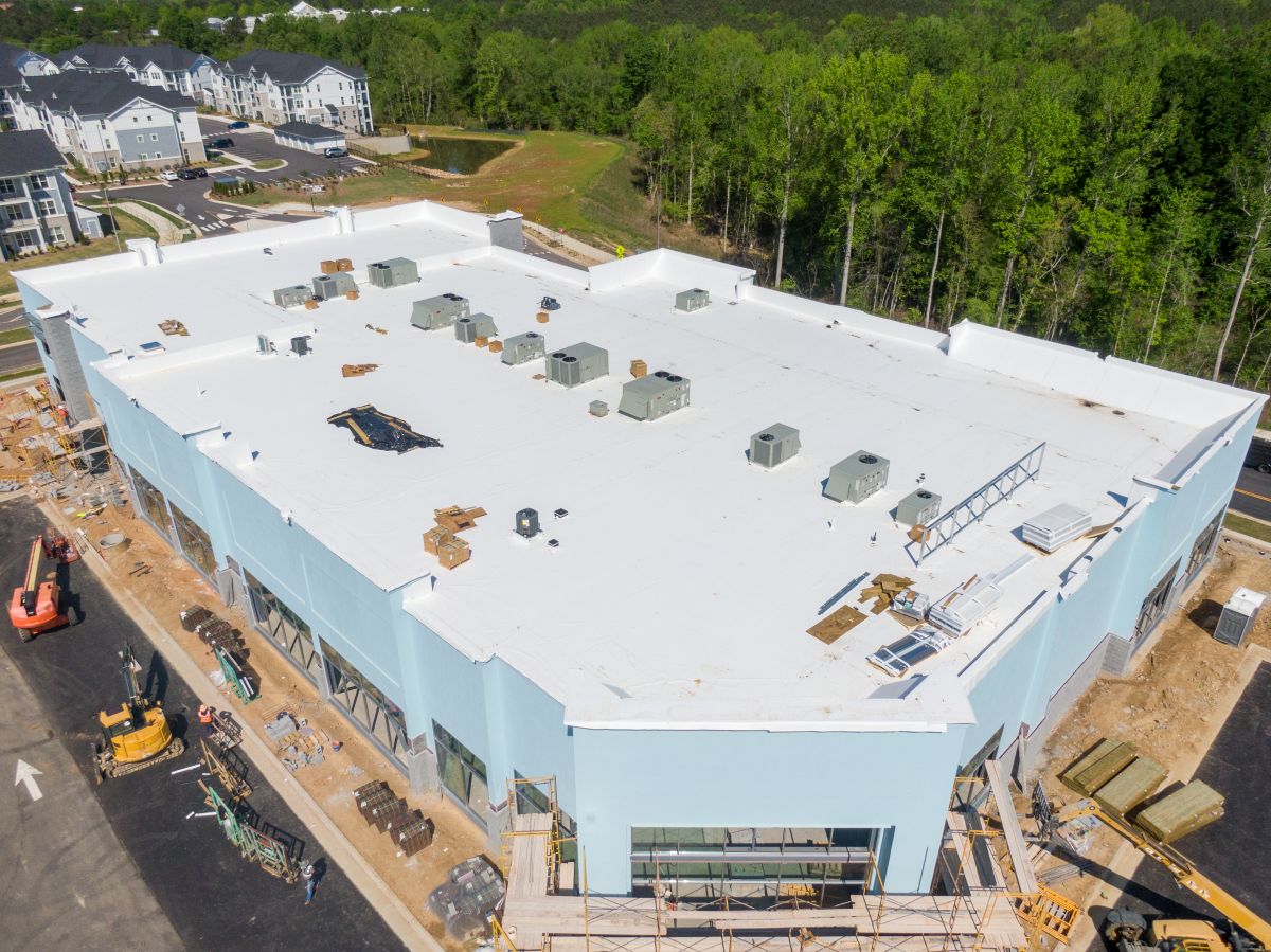 Professional Daytime Drone Image of A Building Under Construction and Nearing Completion