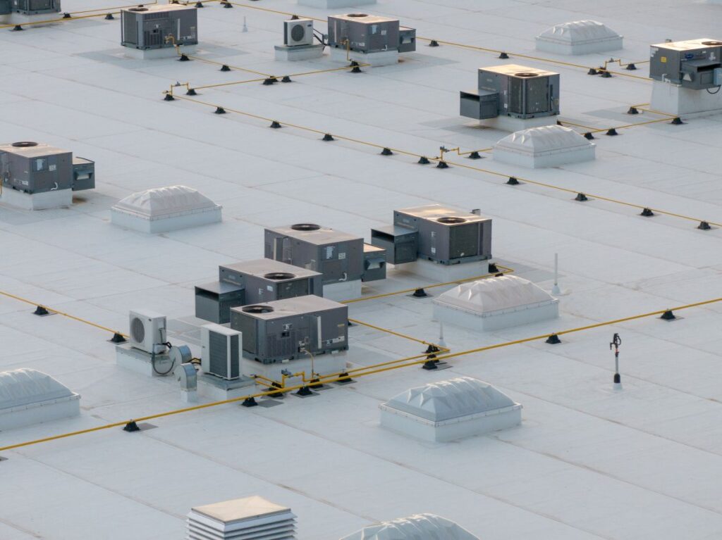 Sky view of a flat roof covered in white