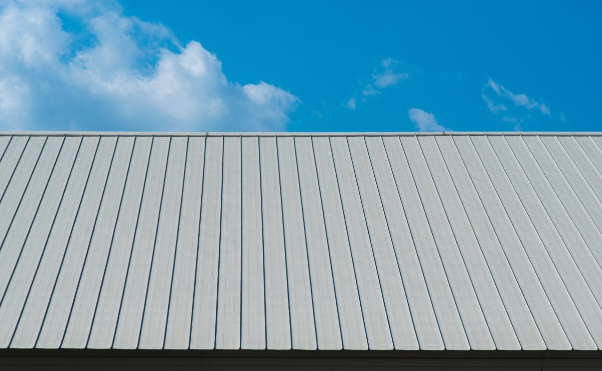 Metal sheet for industrial roof and blue sky