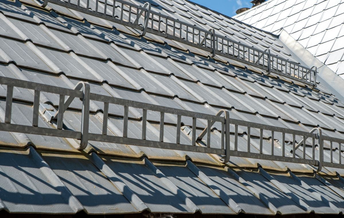 Snow guards, retainers or snow hooks on the Metal roof