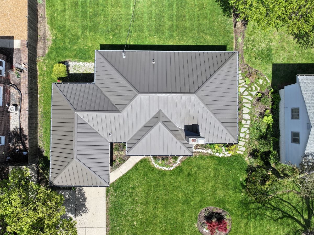 Aerial view of a grey residential metal roof